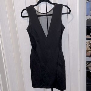 Black slick dress with v style back